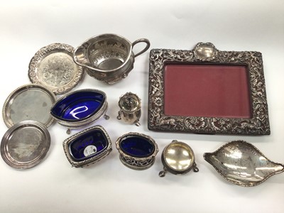 Lot 1026 - Silver photograph frame, various silver salts, silver pepperette, silver dish, three other plated dishes and a white metal milk jug