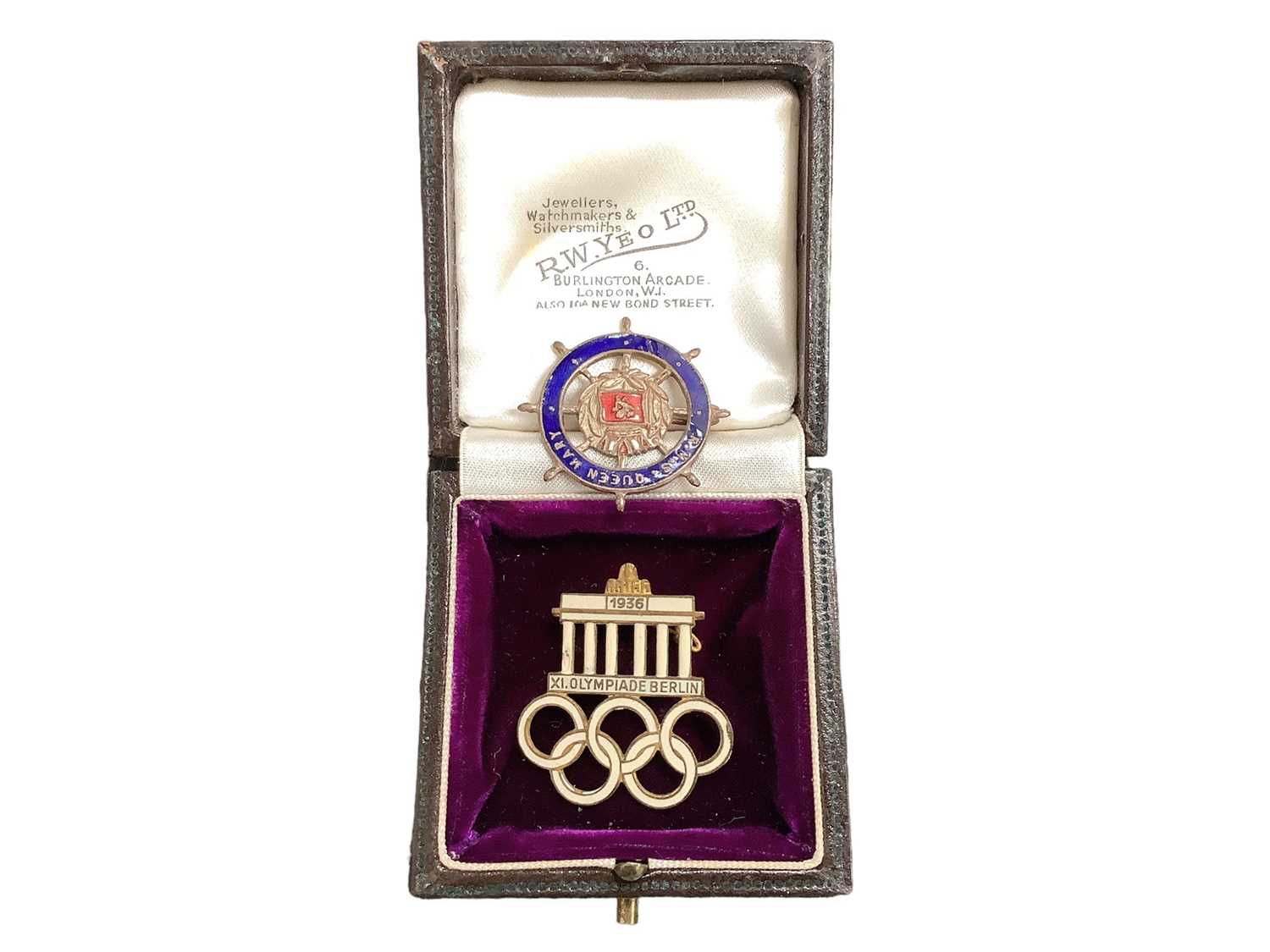 Lot 2524 - 1936 Berlin Olympics enamelled badge and R.M.S Queen Mary enamelled badge (2)