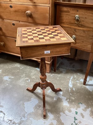 Lot 1209 - Victorian inlaid games table on tripod base