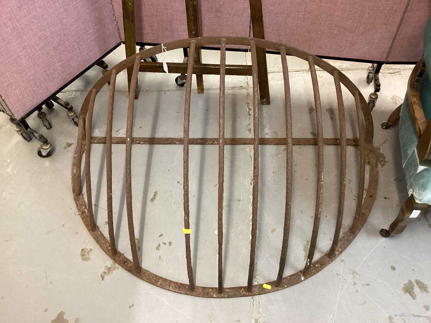 Lot 1278 - Antique iron hay rack and a feed trough named to Maldon Iron Works