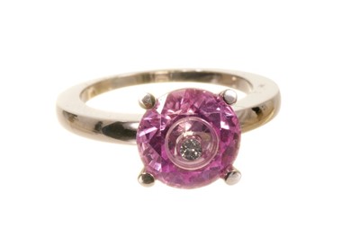 Lot 575 - Chopard: an 18ct white gold, diamond and synthetic pink sapphire 'So Happy Diamonds' ring, signed and numbered 82/6232/05, 6089581, purchased 2008, cased with papers.