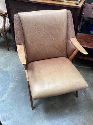 Lot 1276 - Mid century elbow chair with leather upholstery and faux-Crocodile sides