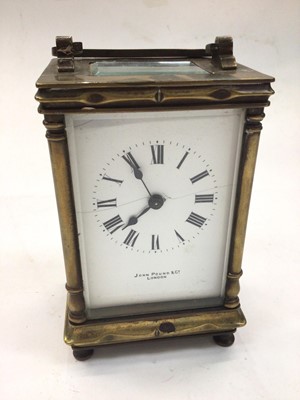 Lot 373 - Brass carriage clock by John Pound & Co, London