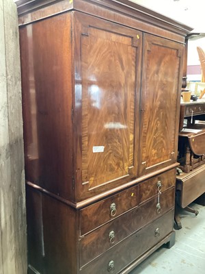 Lot 1265 - George III mahogany linen press