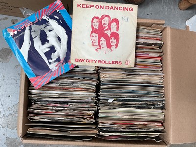 Lot 44 - Four cardboard boxes of singles