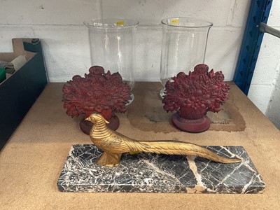Lot 102 - Art Deco French sculpture of a golden pheasant on marble plinth, a pair of 19th century style cast iron door stops and a pair of glass hurricane lamps