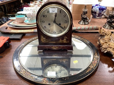 Lot 737 - 1930s mantel clock with striking movement in chinoiserie decorated case together with a matching circular wall mirror (2)