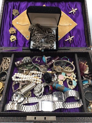 Lot 1072 - Jewellery box containing vintage and later costume jewellery, African white metal necklace, pendants etc, various wristwatches and bijouterie