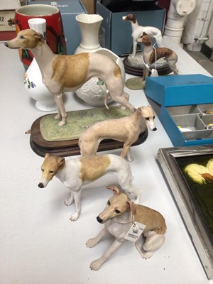 Lot 313 - Group of Border Fine Arts whippet ornaments, two boxed Lladro pandas, Poole pottery vase, Belleek, Coalport etc