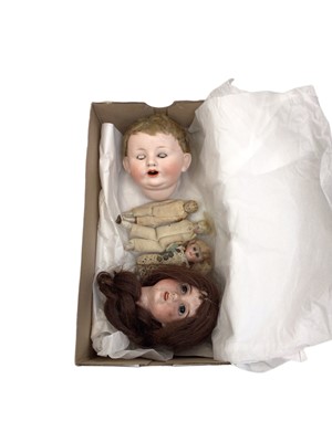 Lot 1887 - Two bisque doll's heads including French SFBJ Paris 4 and F S & Co 1275/35 ( Franz Schmidt) Deponist. Small German Doll dressed and two others.