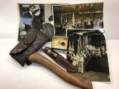 Lot 339 - Boy Scouts axe with leather cover, Scouts pins, related photographs and a hunting knife