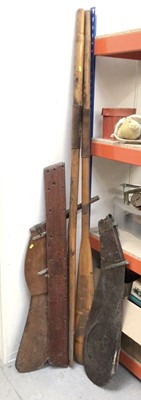 Lot 338 - Pair of wooden rowing oars and two wooden sailboat rudders