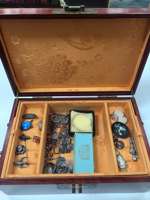 Lot 1015 - Chinese style wooden jewellery box containing a silver charm bracelet, silver brooches, other antique and later brooches, silver cufflinks and bijouterie