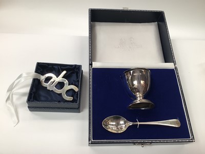 Lot 1018 - Mappin & Webb silver Christening egg cup and spoon cased set (Sheffield 1993), together with a Carrs silver 'abc' bookmark