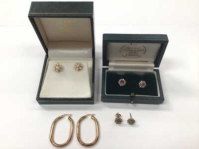 Lot 1022 - Pair of 9ct gold pearl flower head cluster earrings, two pairs of 9ct gold gem set cluster earrings and a pair of 9ct gold hoops