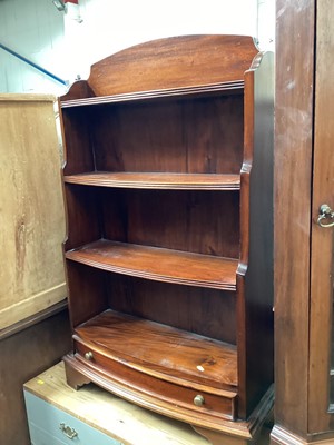 Lot 1215 - Reproduction hardwood waterfall bookcase, 72cm wide, 24.5cm deep, 112cm high