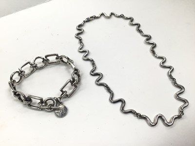 Lot 1030 - Silver wave link necklace and a silver square and circle link bracelet (2)