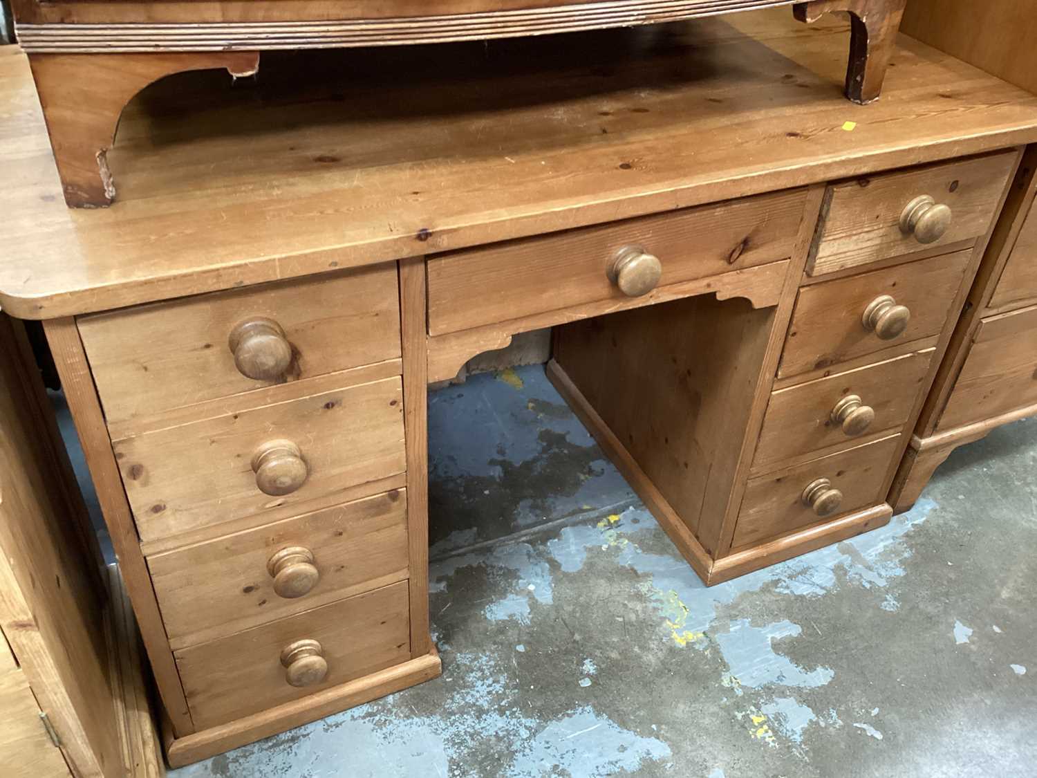 Lot 1224 - Modern pine kneehole desk with nine drawers, 127cm wide, 64cm deep, 78cm high