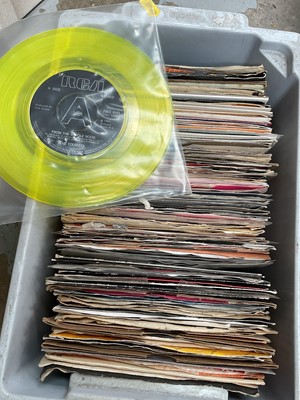 Lot 45 - Five plastic crates of singles, and some CDs
