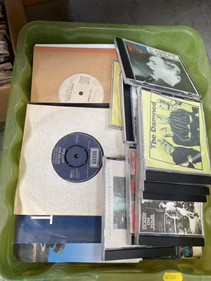 Lot 45 - Five plastic crates of singles, and some CDs