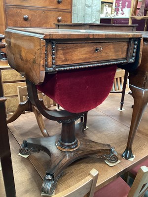 Lot 1236 - Victorian rosewood needlework table with single drawer and pull out well below on turned column and quatrefoil base with scroll feet, 49cm wide, 41.5cm deep, 73cm high