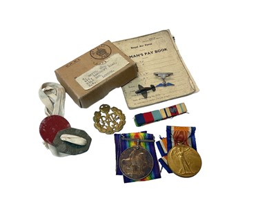 Lot 720 - First World War pair comprising War and Victory medal named to 242147 PTE. T. Smith. Notts. & Derby. R, together with a Second World War medal box of issue and RAF Airman's Pay Book