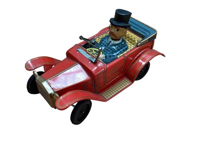 Lot 1918 - Box of tin plate including Tri Ang Minic Ambulance, British Rail Lorry, Wells Brimtoy bus, Japanese car, Areoplane, airship.