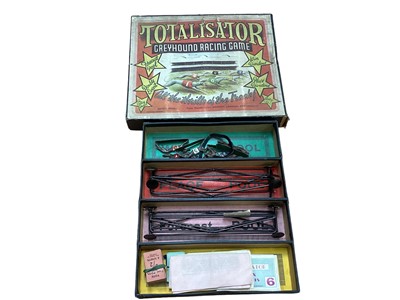 Lot 1916 - Collection of lead figures and Britains die cast models including military bandsmen, F.G. Taylor & Sons elephant ride in box, Totalistor Greyhouse Racing Game etc