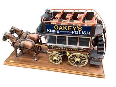 Lot 2515 - Reproduction horse drawn carriage model on wooden base