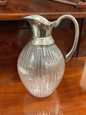 Lot 75 - Silver plated lemonade jug with cut fluted body, 24.5cm high
