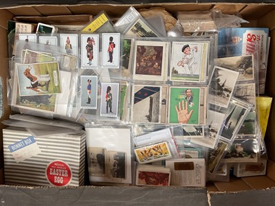 Lot 104 - Box of old cigarette cards, in albums and loose, plus some modern cards