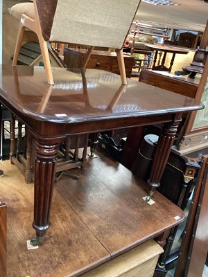 Lot 1257 - Victorian mahogany extending dining table with three extra leaves on turned reeded legs, 107cm x 104cm (opening to 241cm)