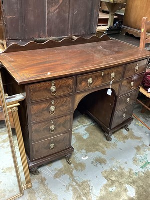 Lot 1283 - Edwardian inlaid mahogany bowfront kneehole desk with seven drawers and on cupboard below, 112cm wide, 49cm deep, 81cm high