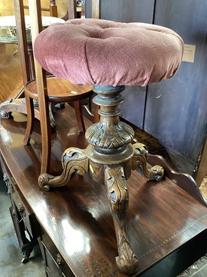 Lot 1284 - Victorian piano stool with revolving adjustable pink upholstered seat on three carved legs