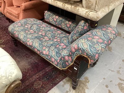 Lot 1297 - Victorian mahogany framed chaise longue with floral upholstery on turned legs and castors