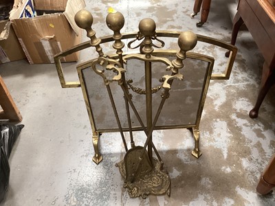 Lot 691 - Brass fireside stand with three utensils and screen