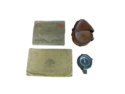 Lot 821 - First World War Officers prismatic compass dated 1918, together with Australian Imperial Force military note book, and an Australian Comforts Fund writing wallet.