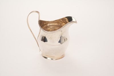 Lot 409 - George III silver cream jug by Anne and William Bateman, 1804