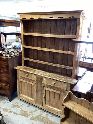 Lot 1312 - Old pine two height dresser with shelves above, two drawers and two panelled doors below, 136cm wide, 34.5cm deep, 190.5cm high