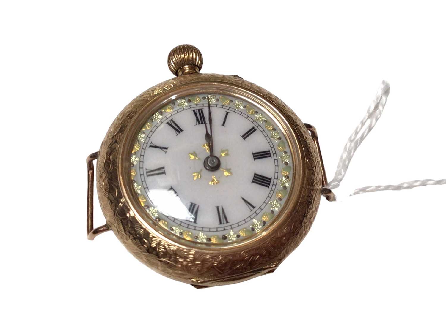 Lot 181 - 14ct gold cased fob watch in a floral scroll