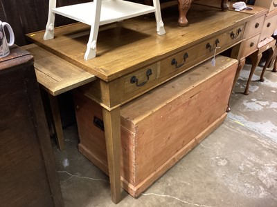 Lot 1319 - Light oak writing table with three drawers and pull out slides on square taper legs, 125cm wide, 64cm deep, 78.5cm high