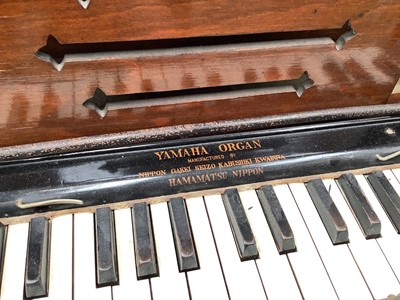 Lot 555 - Yamaha folding wooden organ