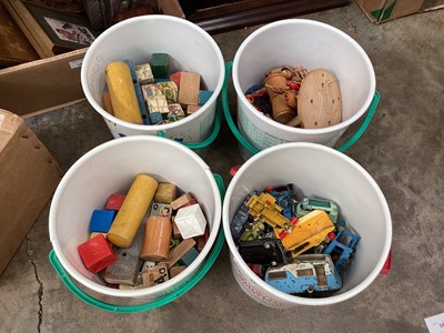 Lot 554 - Circular tubs of toys and boxed toy cars