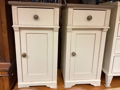 Lot 1325 - Pair of painted pine bedside chests with single drawer and panelled door below, 39cm wide, 38cm deep, 76cm high, together with another four drawer bedside chest, 40cm wide, 36cm deep, 81cm high (3)