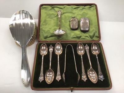 Lot 1055 - Set of six silver teaspoons and pair of silver sugar tongs in fitted case, Scottish silver sifting spoon, two silver vesta cases and a silver backed brush