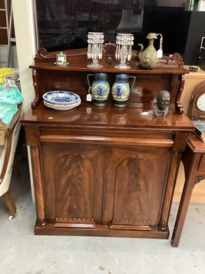 Lot 1367 - Victorian mahogany chiffonier with raised ledge back, frieze drawer and two arched panelled doors below, 97.5cm wide, 40.5cm deep, 127cm high