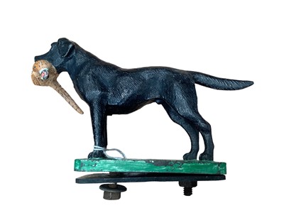 Lot 2153 - Louis LeJeune - cold painted bronze car mascot of a black Labrador carrying a pheasant, marked LE to base, made in England.