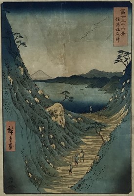 Lot 9 - Hiroshige - 34cm x 22cm and a similar print, 24cm x 39cm, in glazed frames (2)