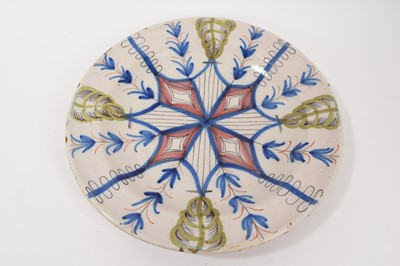 Lot 296 - 18th century tin glazed charger