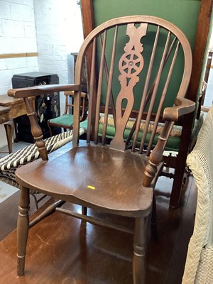 Lot 1403 - Set of five oak wheelback chairs, comprising four standards and one carver